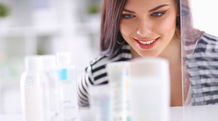 woman-viewing-cosmetics_sm